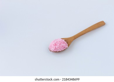 Salt Pink Aloma In Spoon Isolated On White Background, Flat Lay, Top View.