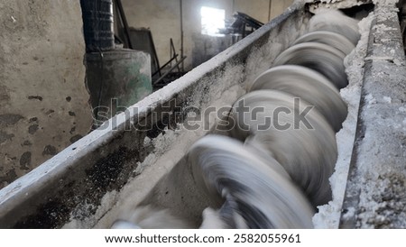 salt processing through conveyor inside factory