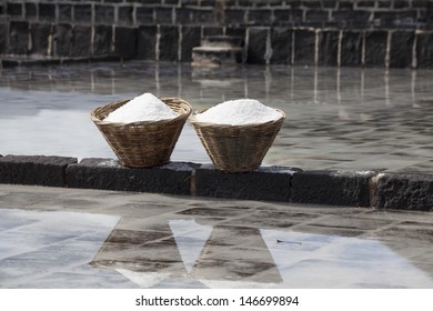Salt Production at Mauritius. Salt from the Indian Ocean. On the picture two basket with salt