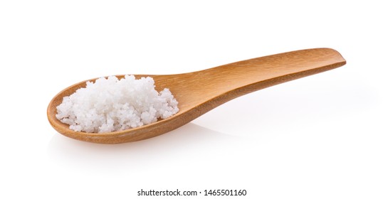 Salt In Wood Spoon Isolated On White Background