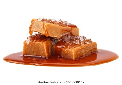 Salted Caramel Candies And Sauce Isolated On A White Background