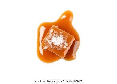 Salted Caramel Candy With Sauce Isolated On White Background