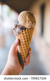 Salted Caramel And Chocolate Ice Cream In A Waffle Cone