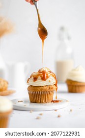 Salted Caramel Cupcakes with Vanilla Muffins, Homemade Salted Caramel - Shutterstock ID 2077122931
