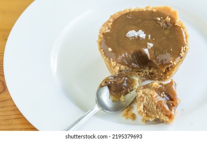 Salted Caramel Tart Being Eaten - Photo With Copy Space