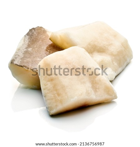 Salted cod fish (baccalà) frozen on white, italian cuisine, isolated, fish, meat, vegetable, sweet, close