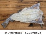 salted cod fish on wooden background