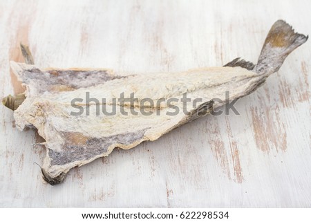salted cod fish on wooden background