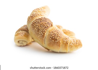 Salted croissant bun roll with sesame seeds. Homemade pastry isolated on white background. - Powered by Shutterstock