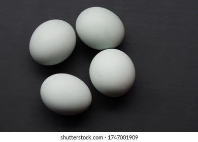 A Salted Duck Egg On Black Isolated Background