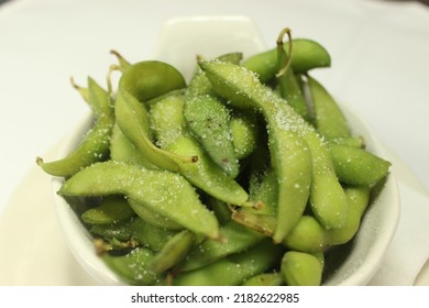 Salted Edamame In White Ceramic Bowl