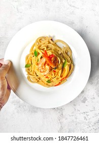 Salted Egg Pasta With Prawn And Curry Leaves