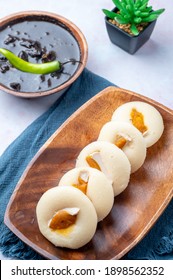 Salted Egg Puto (topshot) Paired With Pork Blood Stew- A Famous Filipino Delicacy Best Eaten Together For A Perfect Savory And Sweet Food Experience.