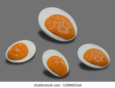 Salted Egg Yolk Dripping On Grey Background 