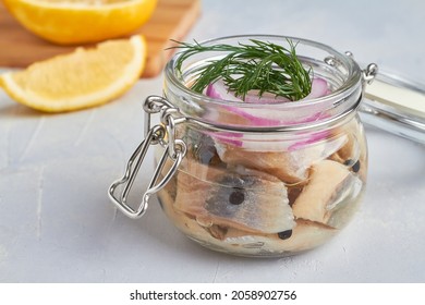 Salted Fillet Of Herring In A Glass Jar