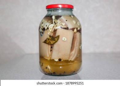 Salted Lard In Brine In Jar With Spices.