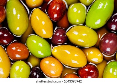 Salted olives of several varieties in brine - Powered by Shutterstock