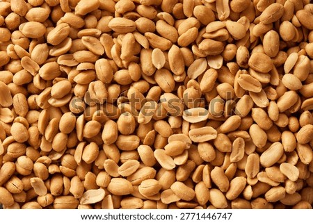 Salted roasted peanuts full frame. Top view