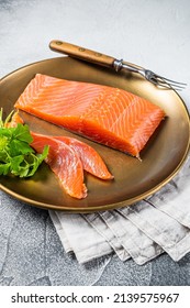 Salted Salmon Fillet With Thyme In A Steel Plate. White Background. Top View.