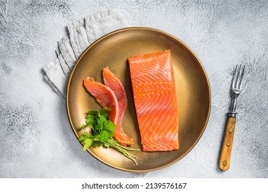 Salted Salmon Fillet With Thyme In A Steel Plate. White Background. Top View.