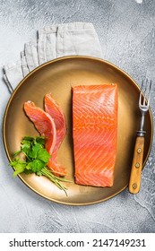 Salted Salmon Fillet With Thyme In A Steel Plate. White Background. Top View.