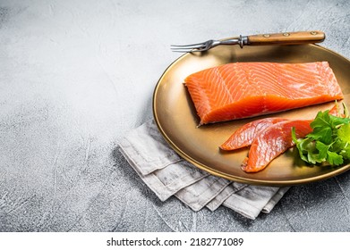 Salted Salmon Fillet With Thyme In A Steel Plate. White Background. Top View. Copy Space.