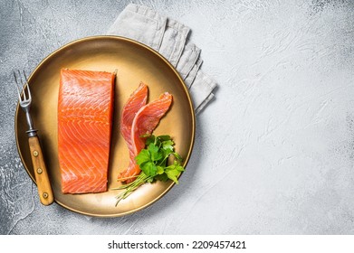 Salted Salmon Fillet With Thyme In A Steel Plate. White Background. Top View. Copy Space.