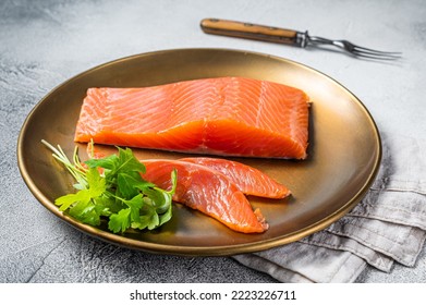 Salted Salmon Fillet With Thyme In A Steel Plate. White Background. Top View.