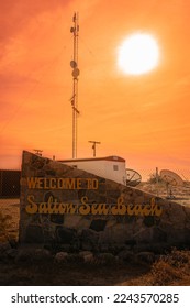 Salton Sea area landscape series, Sunset over the welcoming sign at the beach entrance, in Southern California, USA