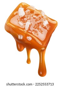 Salty caramel candy and drops of milk caramel sauce flowing down from it. File contains clipping path.