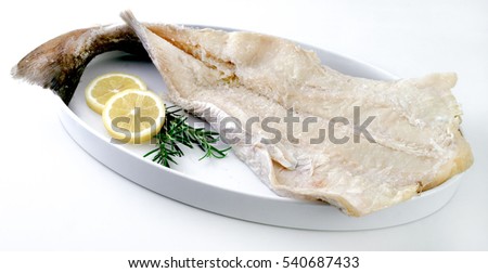 Salty dry fish with garlic and oregano.