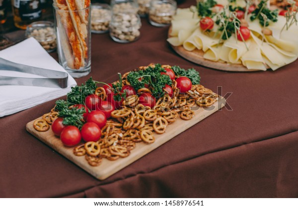 Salty Nuts On Wooden Desk On Stock Photo Edit Now 1458976541