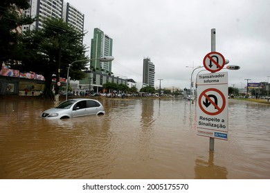 salvador, bahia, brazil - april 19, 2015: vehicle is seen in flooded area with rainwater on a street in Salvador city. 