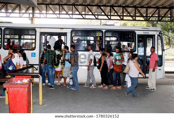 salvador, bahia / brazil - april 4, 2013:\
passengers are seen in line to board public transport buses at\
Estacao Piraja in the city of\
Salvador.