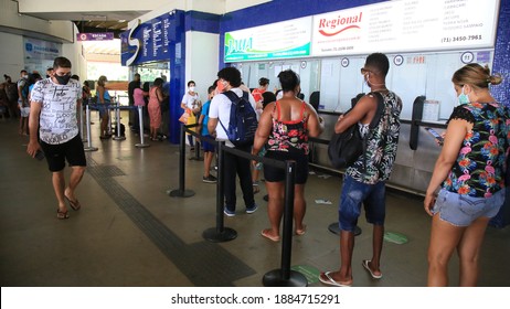 Salvador, Bahia, Brazil - December 30, 2020: People Are Seen At The Counter To Buy Intercity Bus Tickets At The Bus Station In The City Of Salvador.