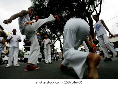 SALVADOR, BAHIA / BRAZIL - July 13, 2015: Young people are seen playing capoeira during event in downtown Salvador. 

