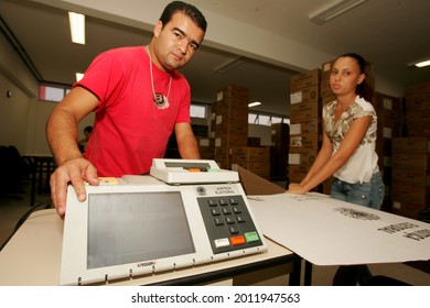 salvador, bahia, brazil - october 1, 2010: Technician reviews an electronic ballot box of electoral justice before elections in the city of Salvador.