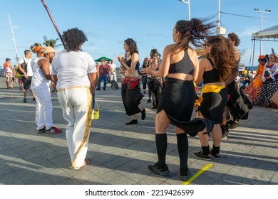 Salvador, Bahia, Brazil - October 22, 2022: People Performing Street Dance With Samba And Capoeira At Farol Da Barra Square In Salvador, Brazil.