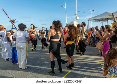 Salvador, Bahia, Brazil - October 22, 2022: People Performing Street Dance With Samba And Capoeira At Farol Da Barra Square In Salvador, Brazil.