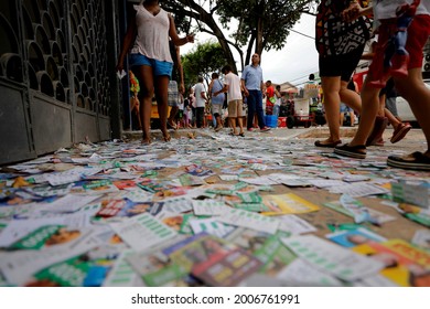 salvador, bahia, brazil - october 7, 2018: flyers with images of candidates are seen on the ground in front of a polling station during elections in the city of Salvador. 