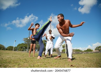 salvador, bahia, brazil - september 19, 2021: capoeristas are seen in a capoeira roda in the Parque Metropolitando do Abaete in the city of Salvador.