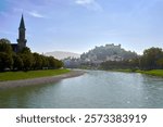  Salzach River Festung Hohensalzburg Salzburg Austria. Salzach river and the Salzburg skyline with Festung Hohensalzburg in the background.

                              