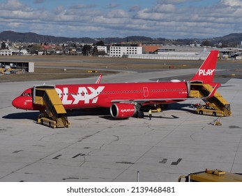 Salzburg, Austria - February 5 2022: Airbus A321 Plane from Play Airlines parked at Salzburg Airport (SZG) tarmac during the winter ski season