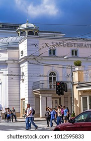 Salzburg, Austria - July 15, 2017: Group Of Tourists Near State Theater ( Salzburger Landestheater), Home To Opera, Theatre, Dance And Theatre For Young Audiences, At Cloudy Summer Day