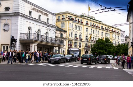 Salzburg, Austria - July 15, 2017: Group Of Tourists Near State Theater ( Salzburger Landestheater), Home To Opera, Theatre, Dance And Theatre For Young Audiences, At Cloudy Summer Day