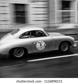 SALZBURG / AUSTRIA - JUNE 2018: 
Various speedy classic Porsche cars with motion blur during the Gaisberg rally in the streets of Salzburg.