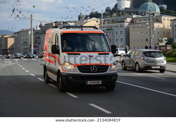 SALZBURG, AUSTRIA - SEPTEMBER 7, 2014:\
Ambulance emergency van on duty in the city\
street
