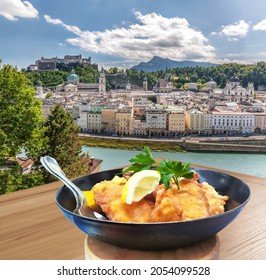 Salzburg City With Gastronomic Experience Of Typical Austrian Food Against Downtown In Austria