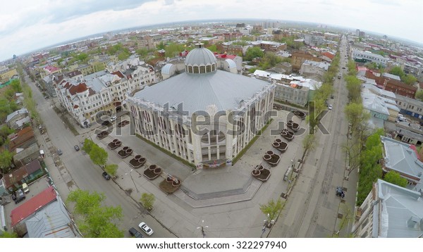 SAMARA - MAY 10, 2015: Townscape with entrance\
of State Philharmonic of Samara at spring day. Aerial view video\
frame. Edifice was built in\
1975-1988.