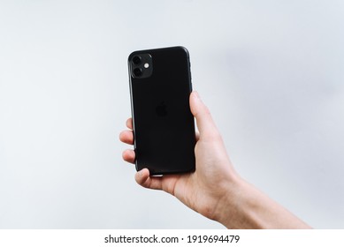 Samara Russia - 04.05.2020: A Young Man Holding In A Smartphone In Hand. The Back Of The IPhone 11, 2 Cameras. Customer Holding The Iphone 11 Black In Their Hand